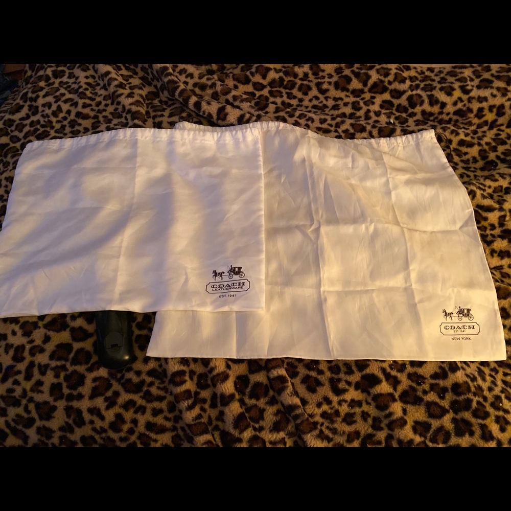 2 Coach Bag Dust Covers. 1 small and 1 medium.
